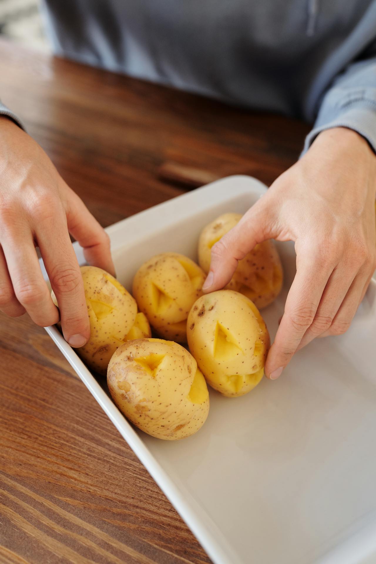 tray with baked potatoes
